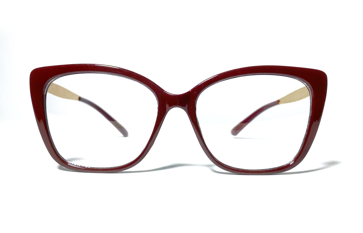 Red cat-eye glasses on a white background
