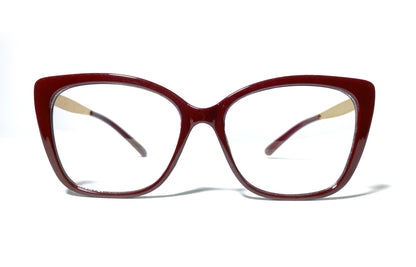 Red cat-eye glasses on a white background