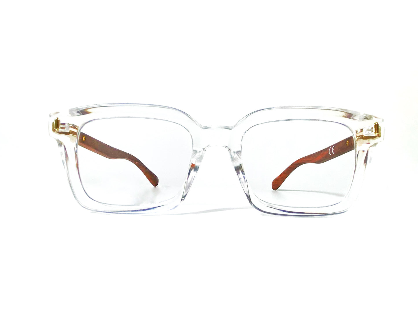 Clear eyeglasses with gold accents on a white background